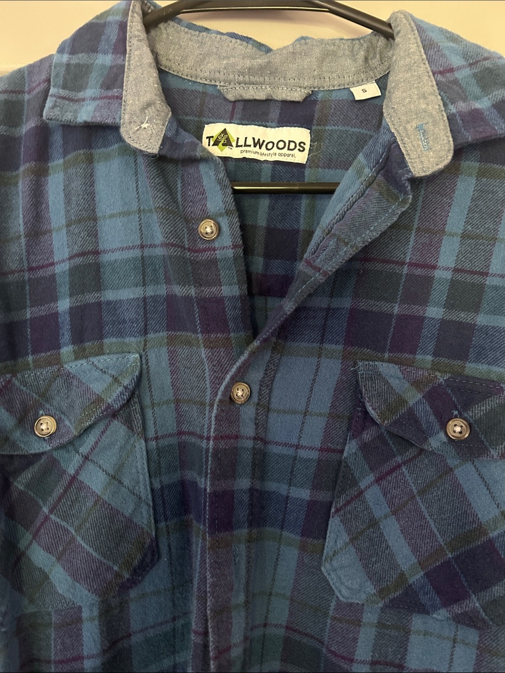 Tallwoods  Blue plaid flannel Button-Up Shirt. Frayed at the bottom and sleeve